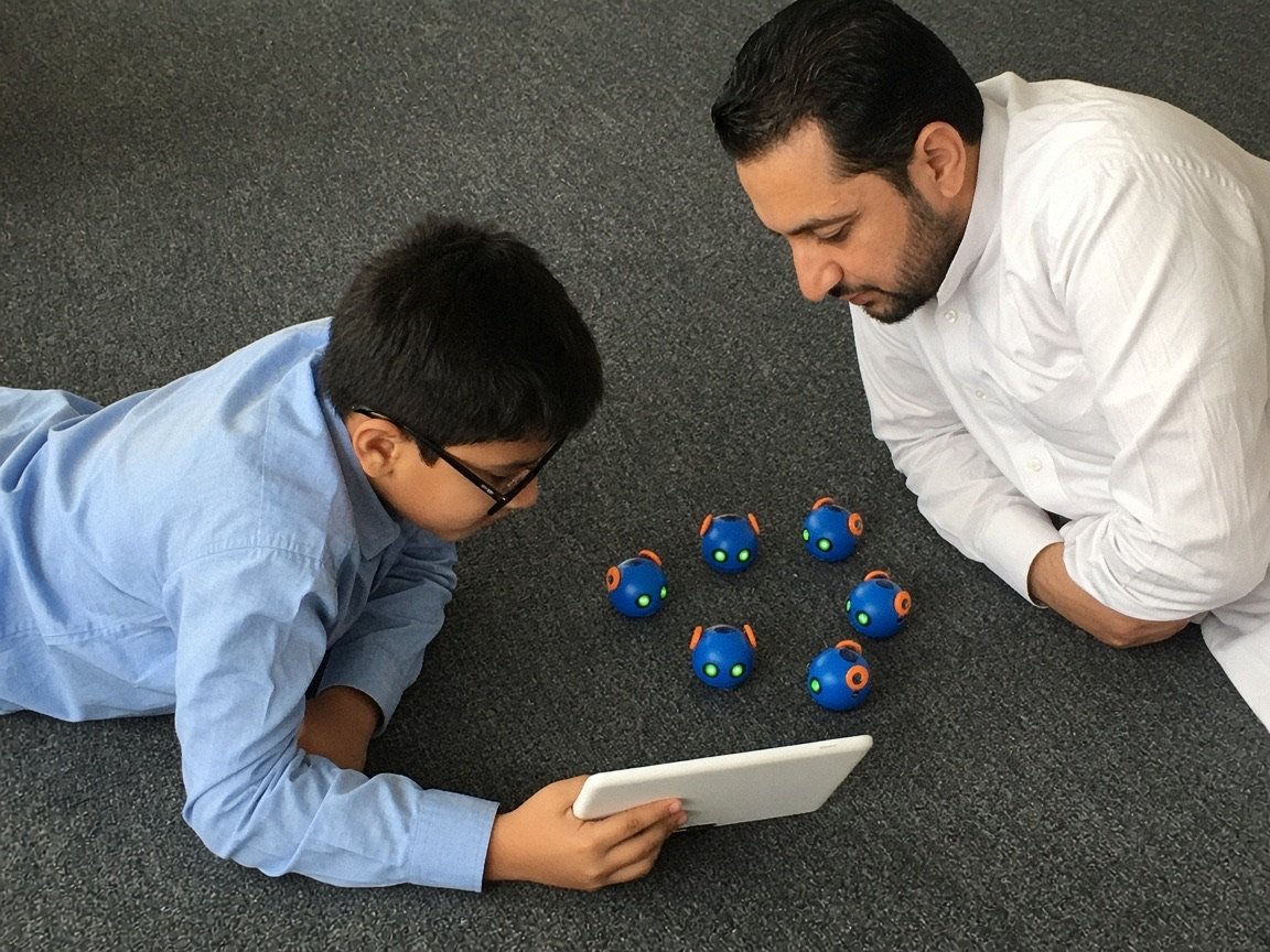 A young student working on a tablet